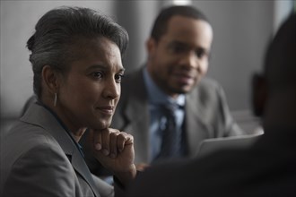 Business people talking in meeting