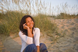 Asian woman talking on cell phone