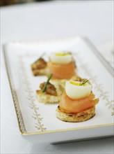 Close up of salmon and quail egg appetizers