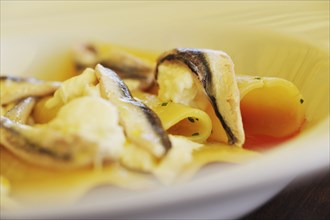 Close up of fish and pasta dish