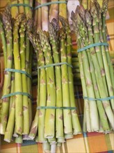 Close up of asparagus bunches