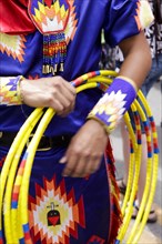 Ceremonial dancer holding hoops