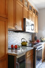 Stove and cabinets in modern kitchen