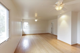 Hardwood floor in empty white room