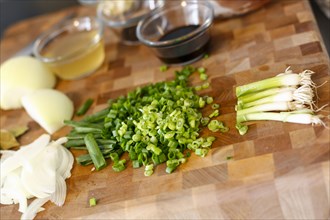 Chopped onions on cutting board