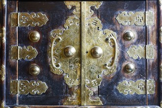 Ornate handles on doors