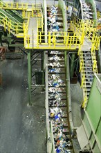 Trash on conveyor belt at factory