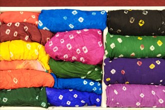 Piles of multicolor fabric