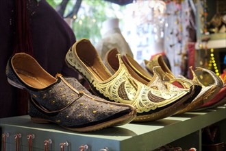 Ornate shoes on shelf