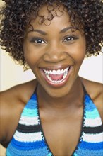 Close up of African woman laughing