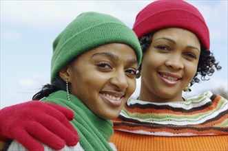 African women wearing winter hats and scarves
