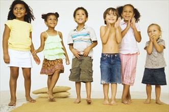 Multi-ethnic children looking excited