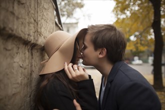 Caucasian man kissing woman on nose