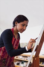 Indian woman painting