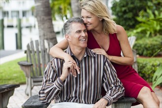 Caucasian couple hugging outdoors