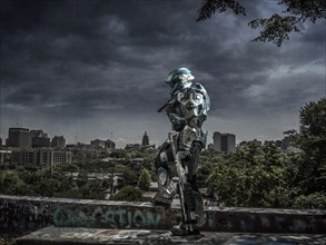 Robot patrolling city holding rifle