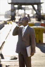 African American businessman talking on cell phone
