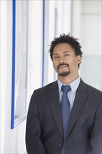Serious African businessman with goatee