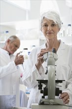 Senior Caucasian scientists working in lab