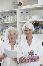 Senior Caucasian scientists working in lab