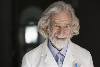 Senior Caucasian smiling scientist