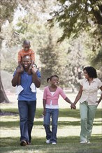 Family walking together in park