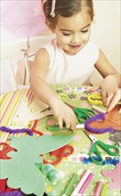Young girl doing arts and crafts