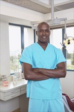 African male dental assistant in office