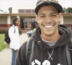 Young African man smiling on school campus