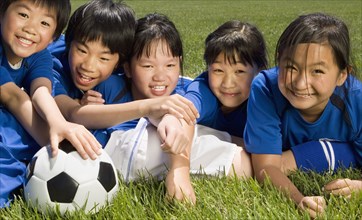 Multi-ethnic children with soccer ball