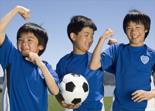 Asian boys with soccer ball