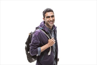 Indian student carrying backpack