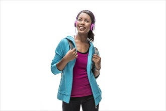 African American woman listening to headphones