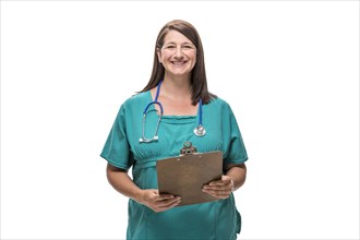 Caucasian nurse holding clipboard
