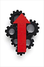 Cogs with red arrow on top