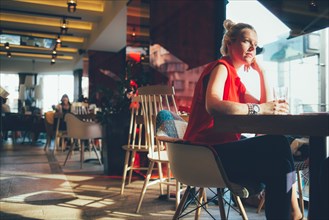 Woman relaxing in cafe