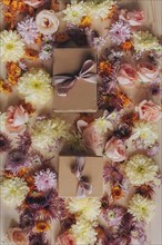 Close up of wrapped gifts and flowers