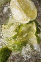Close up of lime in iced drink