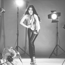 Glamorous woman posing in photo shoot