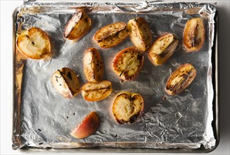 Roasted apples on tray