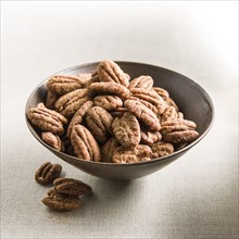 Spicy pecans in bowl