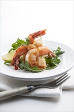 Shrimp on plate with fork