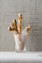 Pastry twists in glass