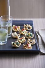 Hors d'oeuvres and glasses on tray
