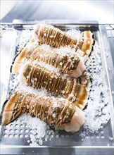 Lobster tails on ice