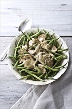Bowl of green beans and mushrooms