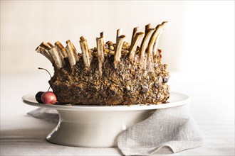 Stuffed lamb crown roast on tray