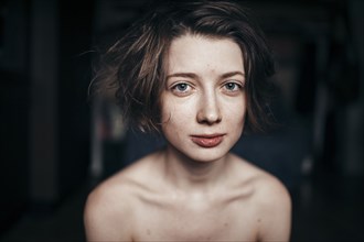 Caucasian woman with bare shoulders