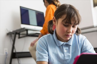 Girl using tablet computer