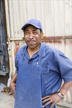 African American worker smiling